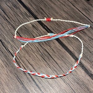 2 red, white, and blue bracelets